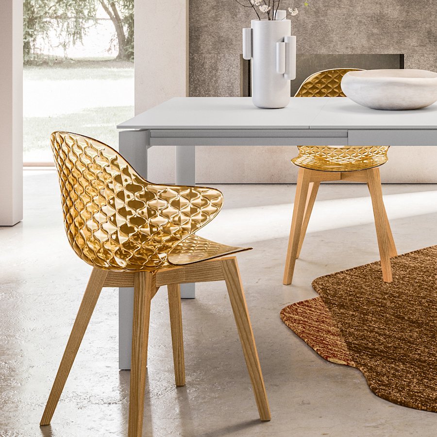 Sedie Saint Tropez Calligaris in rovere naturale e ambra in sala da pranzo